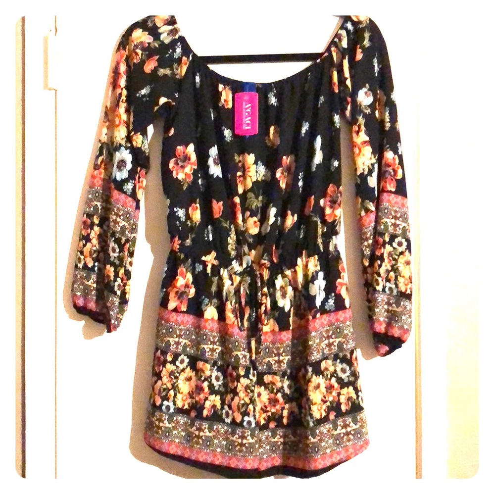 New floral romper with tags from Agaci